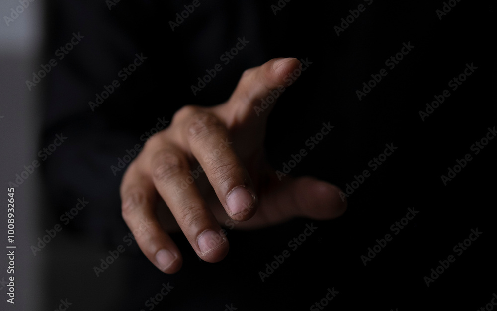 The index finger seems to be touching stock charts and financial charts. Stock market financial volume analysis of the stock market with Graph technology and holograph charts. The index finger seems to be touching stock charts and financial charts. Stock market financial volume analysis of the stock market with Graph technology and holograph charts.