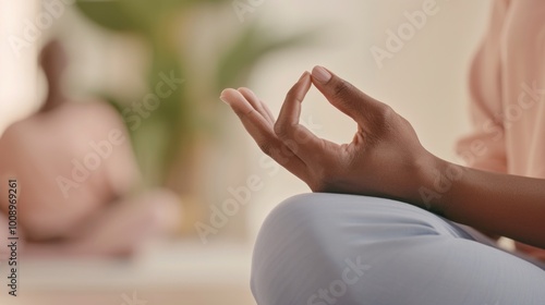 Wallpaper Mural Close-up of a hand in a meditation pose, fingers gently touching. Mindfulness, yoga, or relaxation concepts. Torontodigital.ca