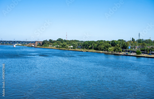 Industrial and residential banks of the Albert canal, Visé, Wallonia, Belgium photo