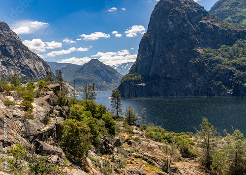 Hetch Hetchy Reservoir from the Wapama Falls Trail. The trail skirts the shoreline with views of the Hetch Hetch Dome, Granite Mountains, and unique vegetation of this part of Yosemite National Park. photo