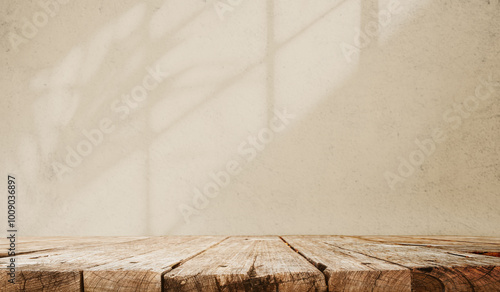 Top wooden table with beige wall texture background for mocking up or display product to make advertising.