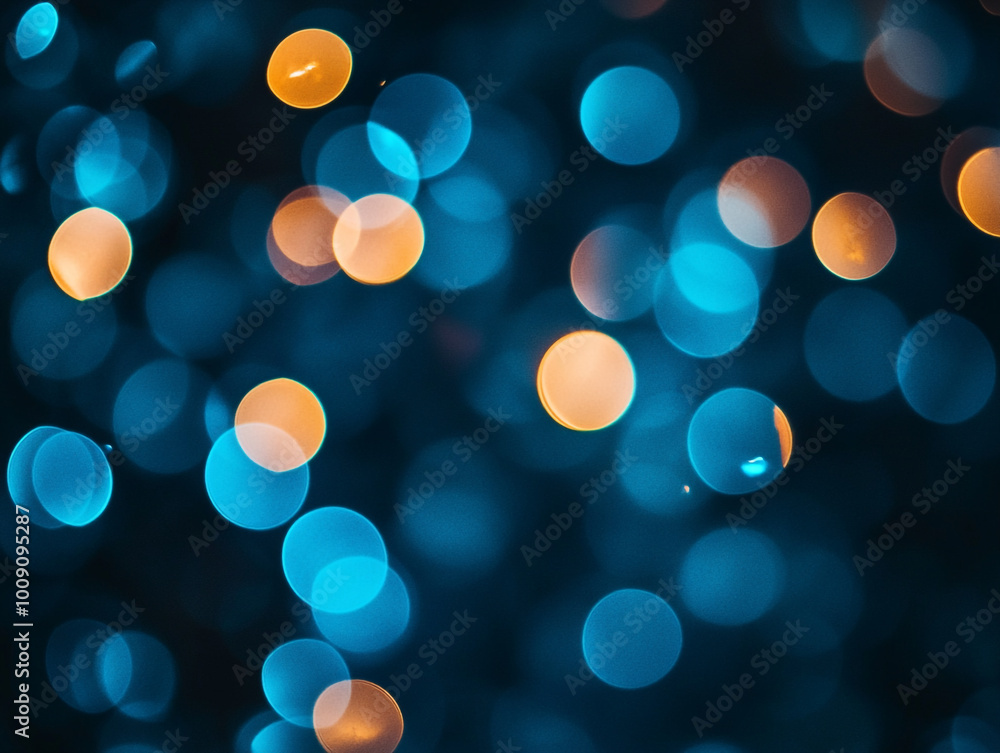 Blurred light blue circles on a dark background. Abstract bokeh lights. Blurred light blue circles on a dark background. Abstract bokeh lights.