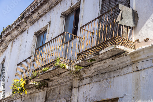 Delapidated balconies on a Spanish building photo