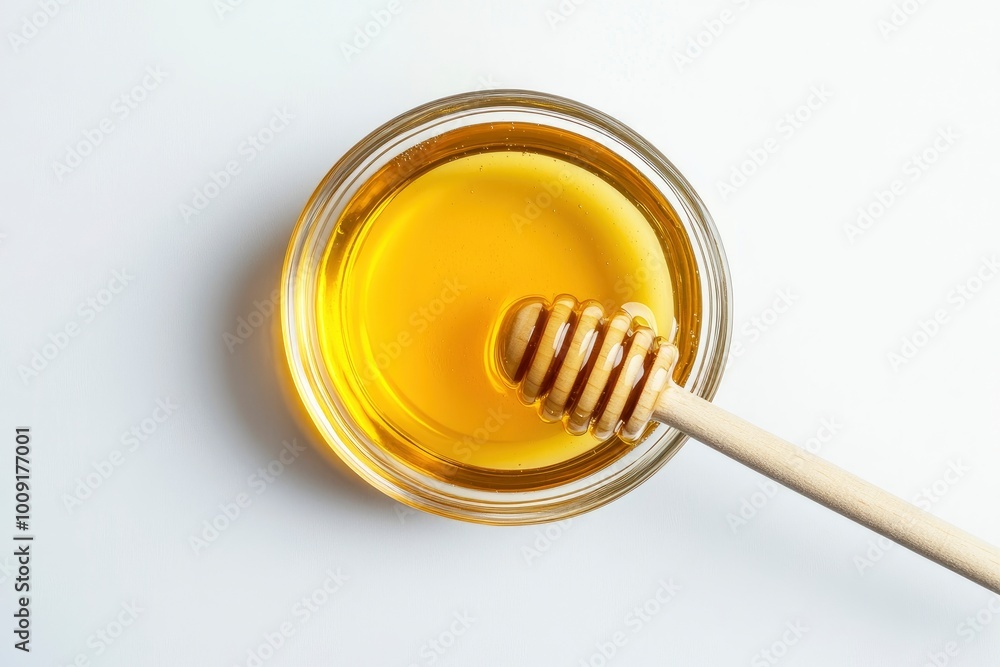 Glass bowl of honey with honey dipper isolated on white background. top view - generative ai Glass bowl of honey with honey dipper isolated on white background. top view - generative ai