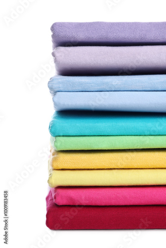 Stack of clean colorful t-shirts isolated on white