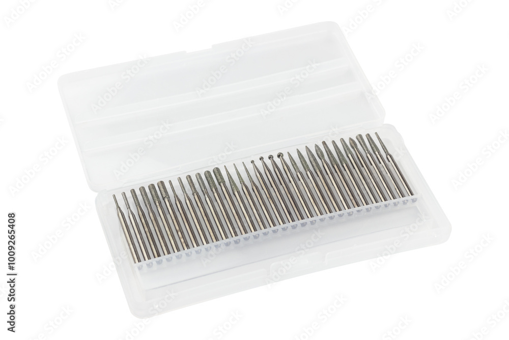 set of cutters for hand engraver and drill with diamond filings, isolated from background set of cutters for hand engraver and drill with diamond filings, isolated from background