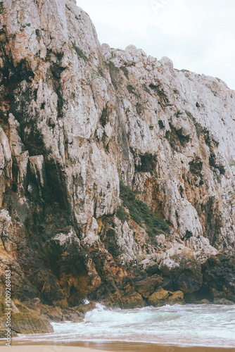 Cliffs and ocean at Beliche beach in Portugal 