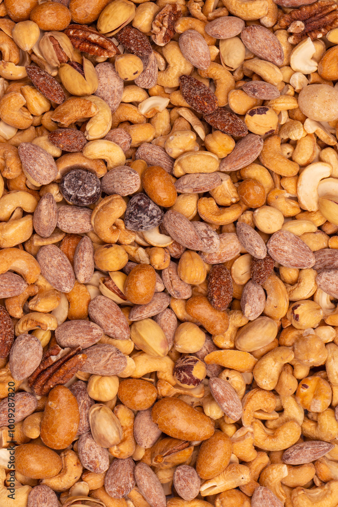 A group of almonds, pistachios, walnuts, macadamia, cashews. A group of almonds, pistachios, walnuts, macadamia, cashews.