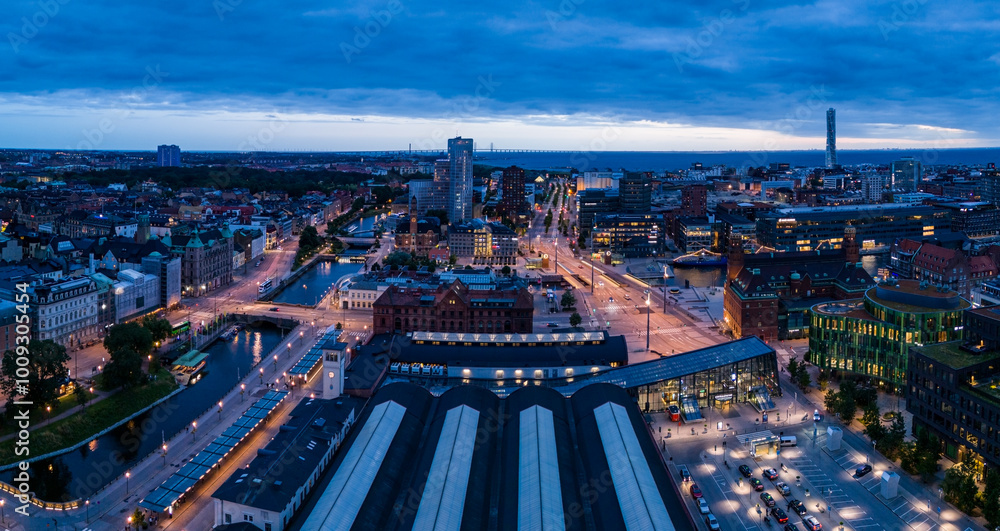 Obraz premium Drone footage at night over the city of Malmö Sweden