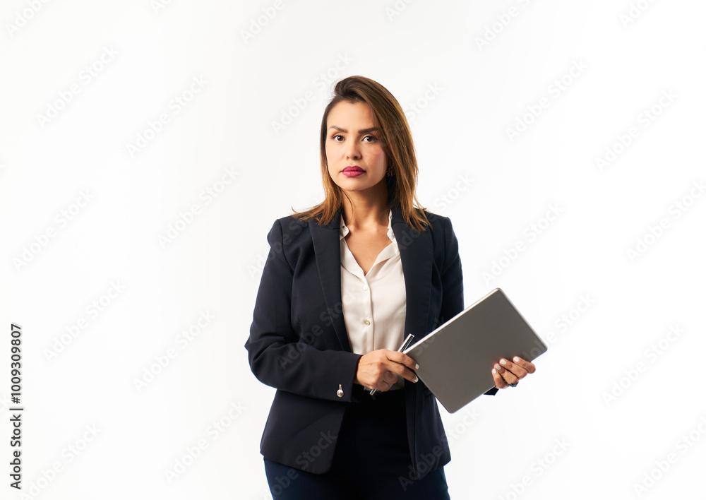 A woman in a business suit holding a tablet A woman in a business suit holding a tablet