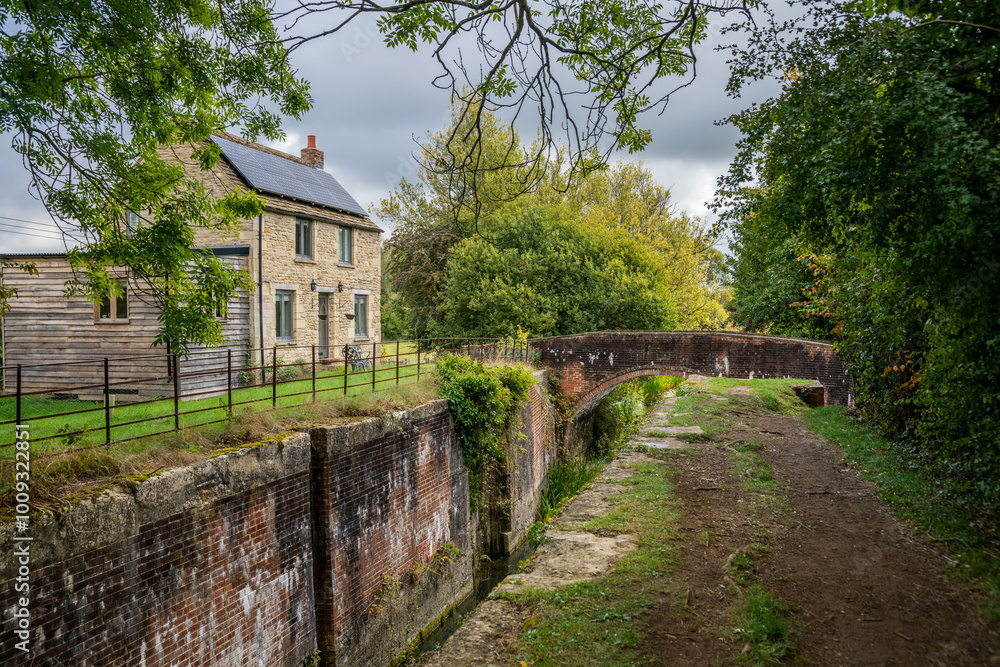 Wildmoorway Lower Lock and bridge on the Severn - Thames Canal, Cerney Wick, England United Kingdom. Wildmoorway Lower Lock and bridge on the Severn - Thames Canal, Cerney Wick, England United Kingdom.