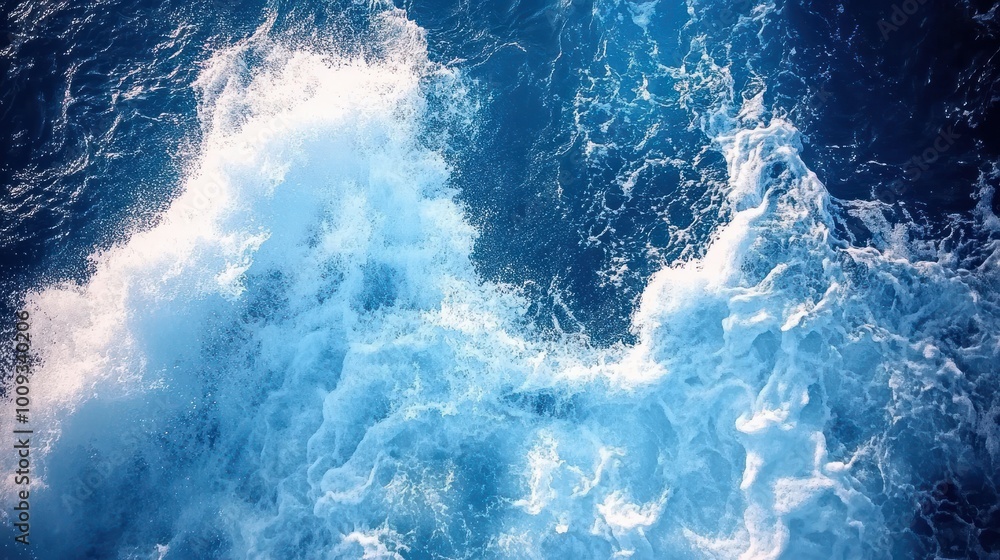 Fototapeta premium Spectacular aerial top view background photo of ocean sea water white wave splashing in the deep sea. Drone photo backdrop of sea wave in bird eye waves.