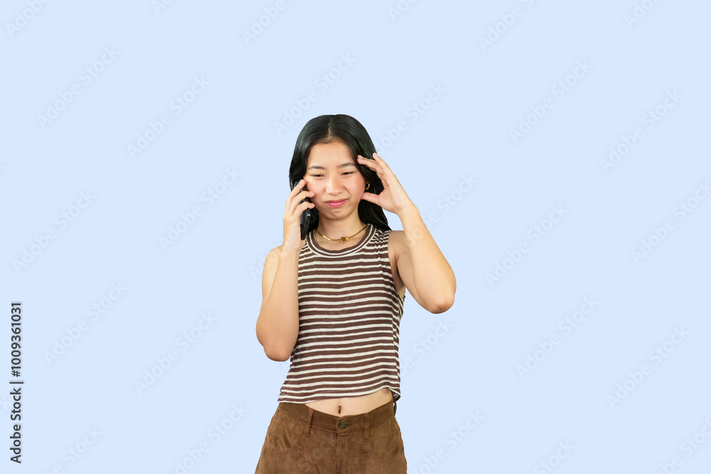Excited Asian Student Girl gives expression hand fa gesture of sad, wow, happy, laughing in blue background Excited Asian Student Girl gives expression hand fa gesture of sad, wow, happy, laughing in blue background