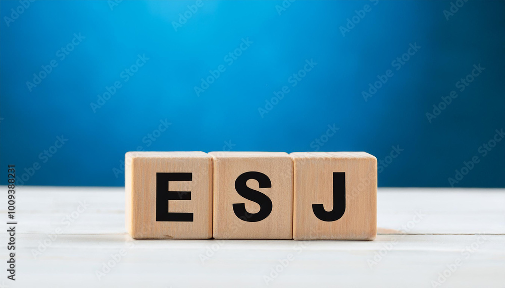 Wooden cubes with abbreviation ESJ. European School of Journalism. Elementary School Journal. Wooden cubes with abbreviation ESJ. European School of Journalism. Elementary School Journal.