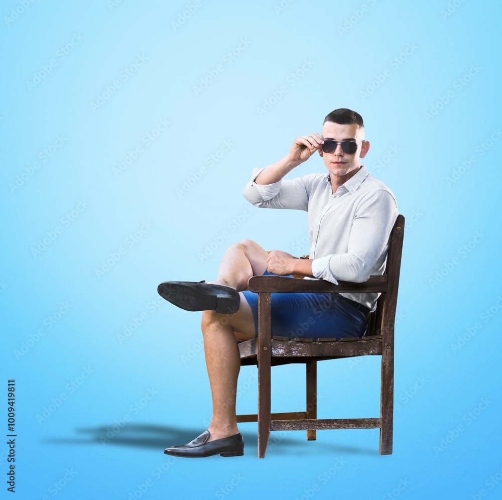 Home lifestyle, young man relaxing on chair Home lifestyle, young man relaxing on chair