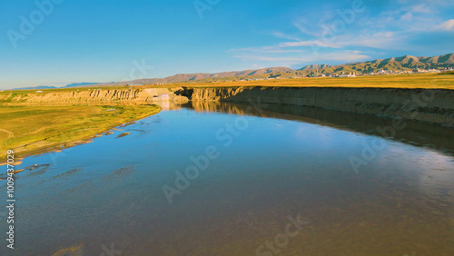 Tranquil Peaks and Shimmering Waters