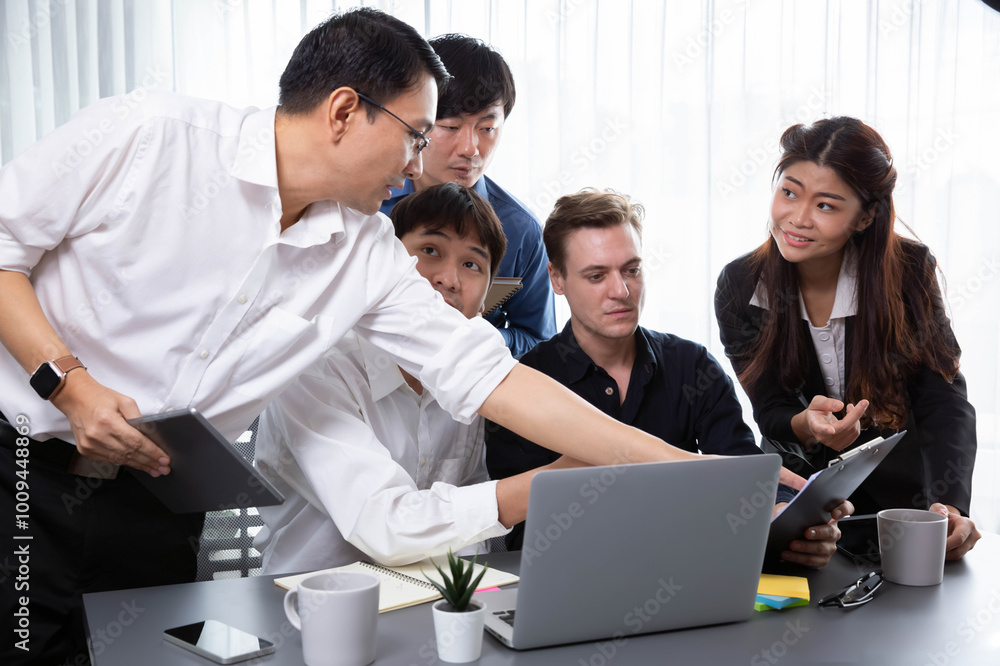 Group of diverse office worker employee working together on strategic business marketing planning in corporate office room. Positive teamwork in business workplace concept. Prudent Group of diverse office worker employee working together on strategic business marketing planning in corporate office room. Positive teamwork in business workplace concept. Prudent