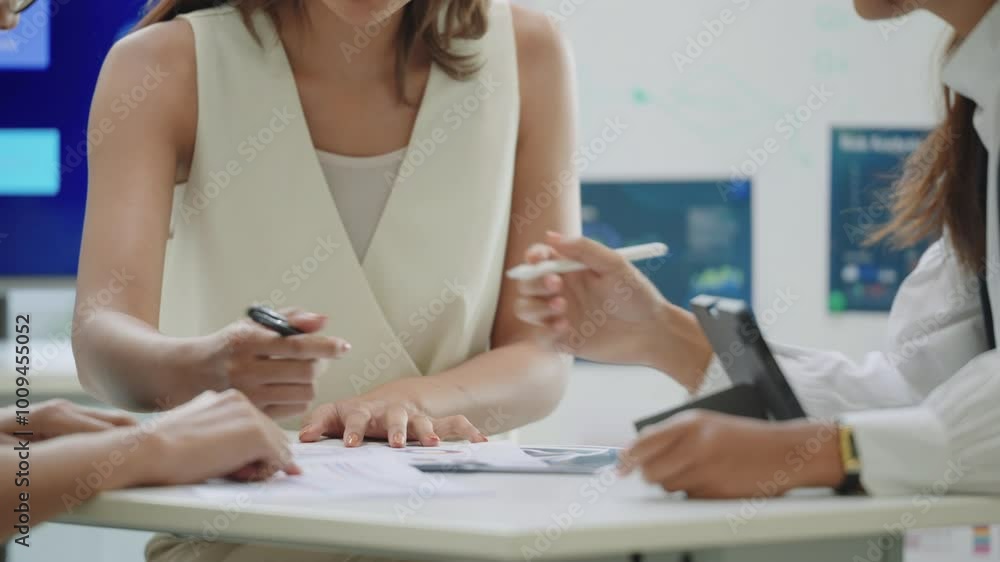 close up hand team of financial discussion fintech technology planning, analyzing digital financial data and strategy in a modern office close up hand team of financial discussion fintech technology planning, analyzing digital financial data and strategy in a modern office
