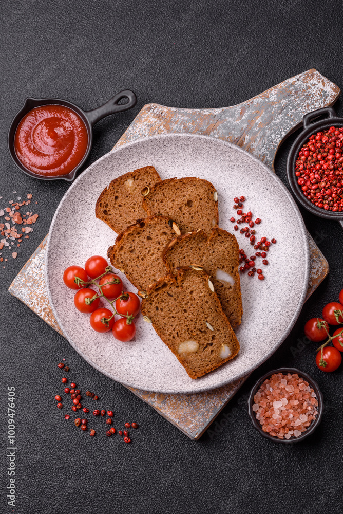 Brown bread with seeds, grains, salt and spices Brown bread with seeds, grains, salt and spices