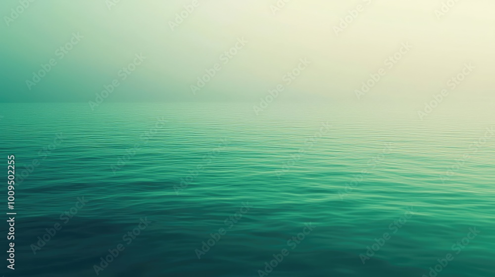 A serene view of calm ocean water under a soft, hazy light, creating a peaceful and tranquil atmosphere. A serene view of calm ocean water under a soft, hazy light, creating a peaceful and tranquil atmosphere.