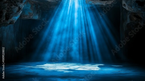 Blue Light Beam Shining Through Cave Entrance with Copy Space
