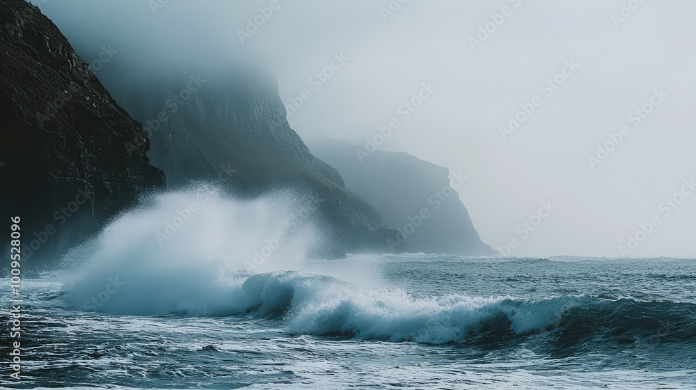Dramatic ocean waves crashing against misty cliffs, capturing the power and beauty of nature in a serene environment. Dramatic ocean waves crashing against misty cliffs, capturing the power and beauty of nature in a serene environment.