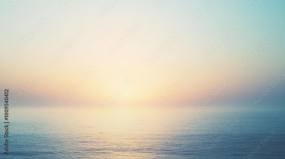 Fototapeta premium Tranquil seascape at sunrise, showcasing serene waters and a soft gradient sky, perfect for relaxation and peaceful imagery.