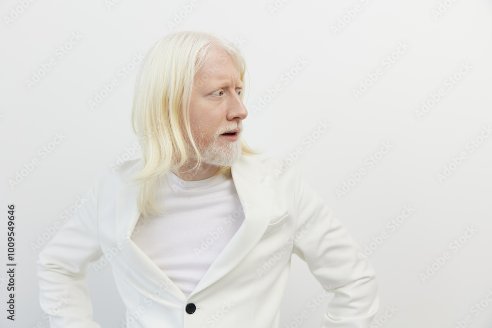 Portrait of a man with long white hair and beard wearing a white blazer, looking sideways against a minimalistic white background, conveying a sense of curiosity and intrigue Portrait of a man with long white hair and beard wearing a white blazer, looking sideways against a minimalistic white background, conveying a sense of curiosity and intrigue