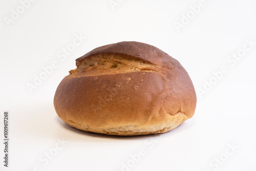 Fresh crispy bread on a white background. Front view