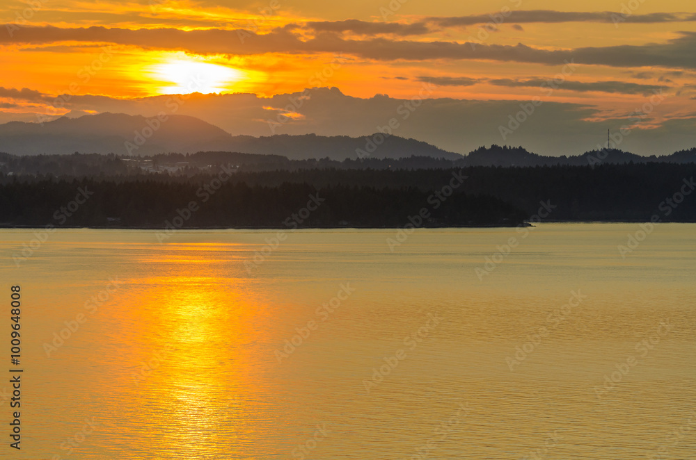 ocean sunset over mountains at summer day in Vancouver, Canada ocean sunset over mountains at summer day in Vancouver, Canada