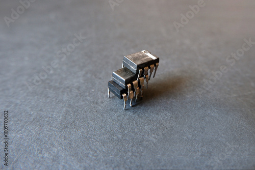 Industrial electronic components. Eight-pin integrated circuits. Semiconductor industry. photo