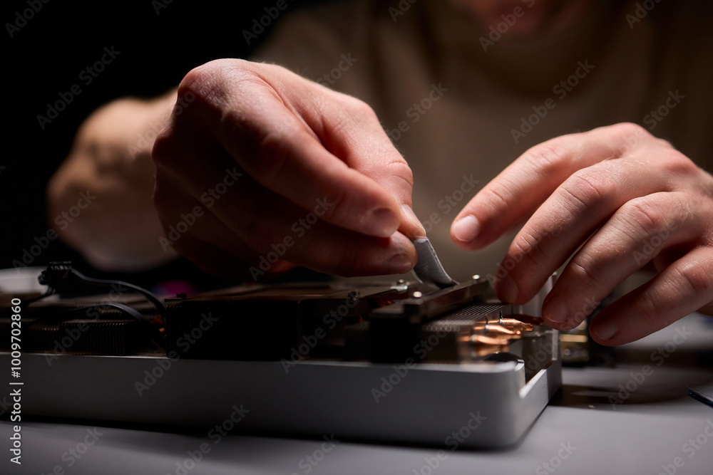 Hand Repairing a Graphics Card through the Application of Thermal Paste for Better Performance Hand Repairing a Graphics Card through the Application of Thermal Paste for Better Performance