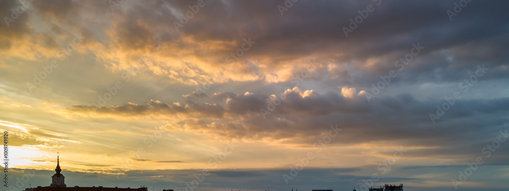 Capture of a beautiful sunset over the skyline, with vibrant colors painting the clouds in the sky. A tranquil moment showcasing nature's artistry. Capture of a beautiful sunset over the skyline, with vibrant colors painting the clouds in the sky. A tranquil moment showcasing nature's artistry.