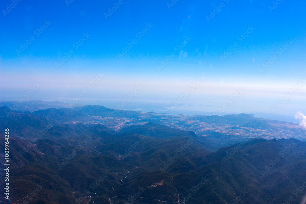 Breathtaking view of the sea and land from the plane in Sardinia Breathtaking view of the sea and land from the plane in Sardinia