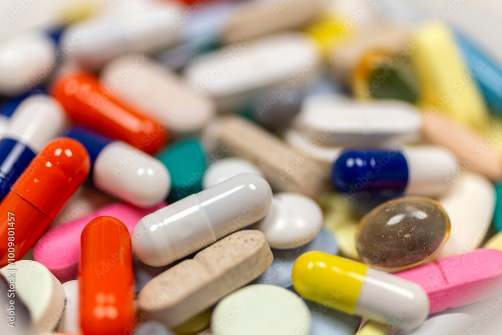 Colorful pills and tablets on white background Colorful pills and tablets on white background