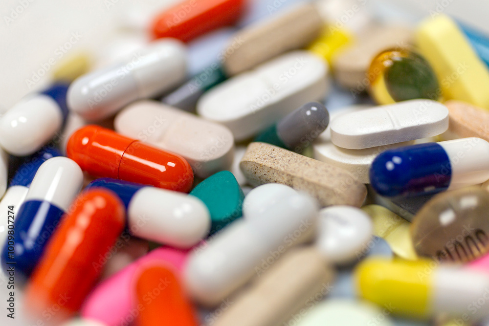 Colorful pills and tablets on white background Colorful pills and tablets on white background
