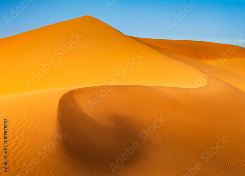 Amazing view of sand dunes in the Sahara Desert. Location: Sahara Desert, Merzouga, Morocco. Artistic picture. Beauty world. Travel concept.