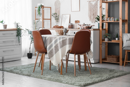 Table and counter with dishes in interior of dining room