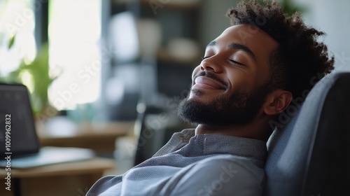 Relaxed Man Enjoying Peaceful Moment at Home