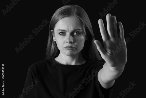 Crying young woman showing ...