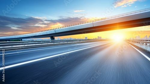 A highway with a bridge over it and a sun in the sky