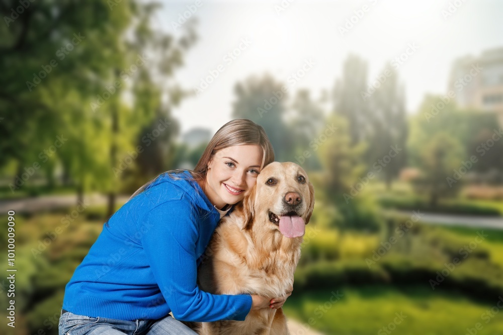 Beautiful young woman walks in autumn park wirh dog Beautiful young woman walks in autumn park wirh dog