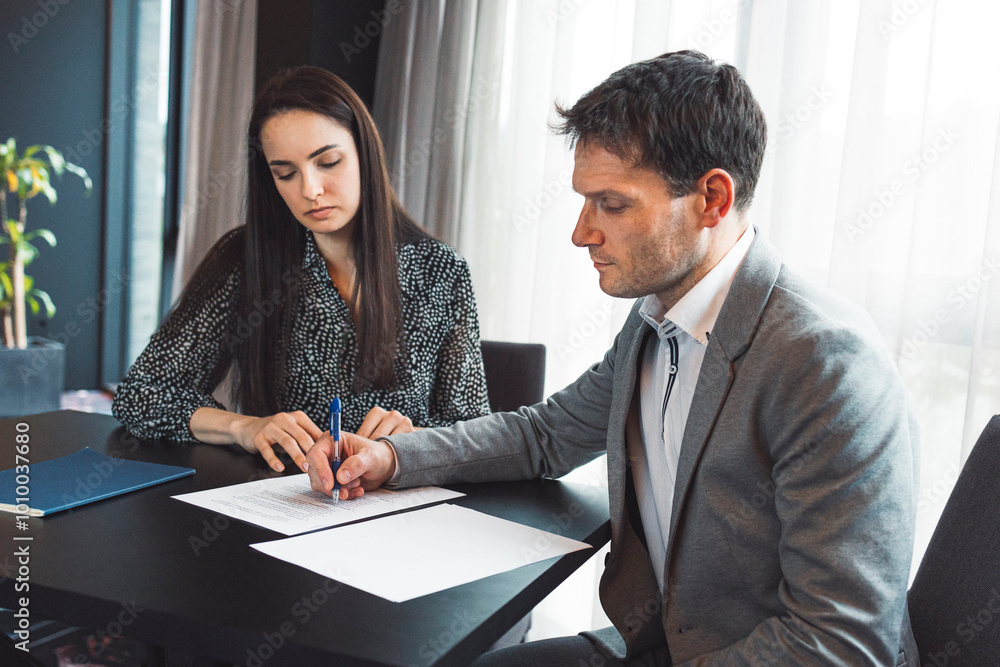 Bank adviser coming to a client to present him new invest options for his retirement, investments, stocks.. Bank adviser coming to a client to present him new invest options for his retirement, investments, stocks..