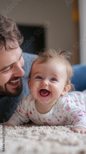 Pure Happiness - Parent Blowing Raspberries on Baby's Belly During Tummy Time photo