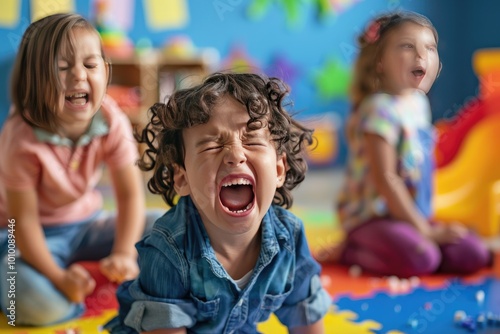 A young child screams loudly during a tantrum at a daycare center, with other children in the background.