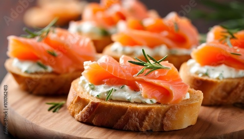 Savory smoked salmon appetizer on toasted bread topped with creamy cheese and a touch of rosemary