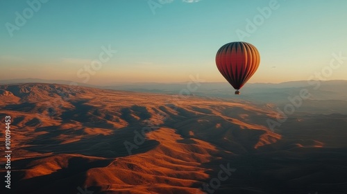 Hot Air Balloon Soaring Above Desert Landscape