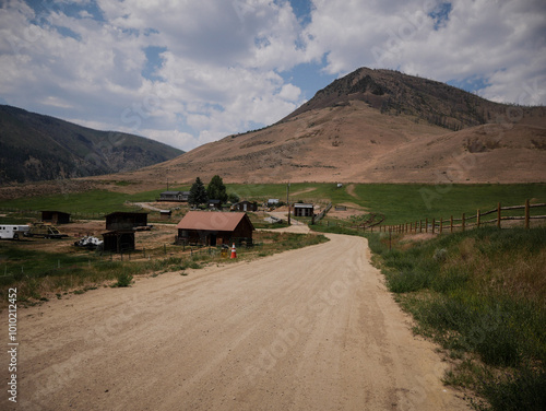 Small ghost town of Sleeping Deer in Challis National Forest in summer photo