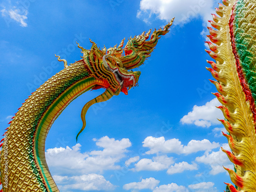 Decorative of Thai style Naga statue for worship in Thai temple photo