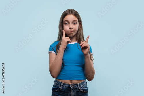 Young girl gestures thoughtfully, pondering decision on light background